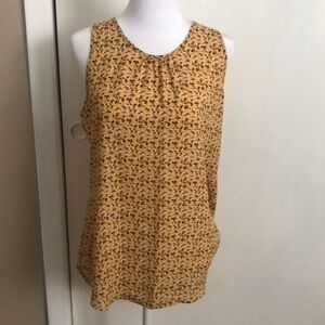 Yellow floral sleeveless blouse